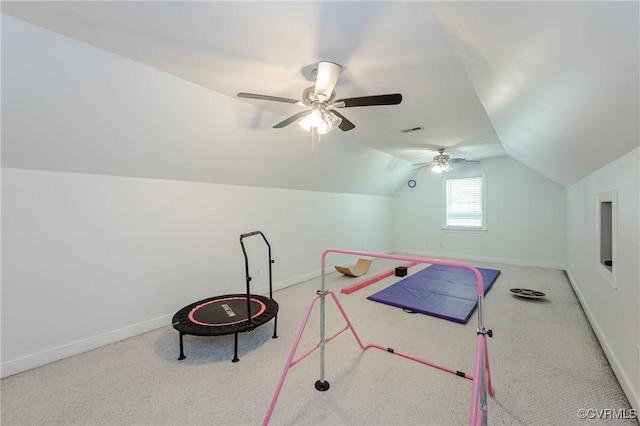 rec room with vaulted ceiling, a ceiling fan, baseboards, carpet flooring, and visible vents