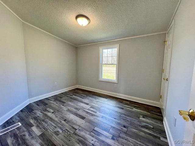 409 Remo Rd, Heathsville, VA 22473 - unfurnished room with dark wood-style floors, crown molding, and visible vents