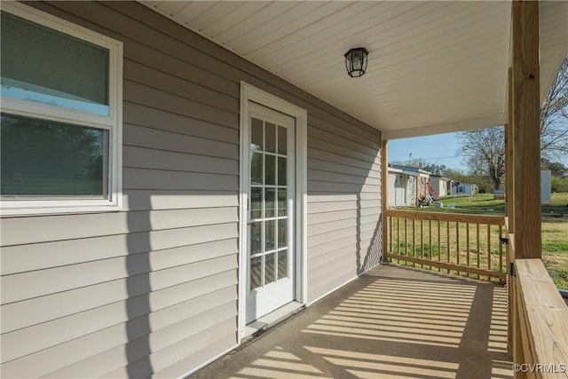 balcony featuring a porch