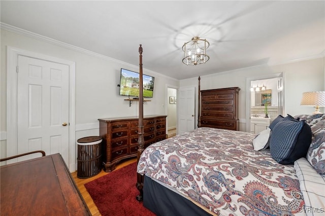 8203 Overbury Rd, Richmond, VA 23227 - bedroom featuring wood finished floors, crown molding, a notable chandelier, and connected bathroom