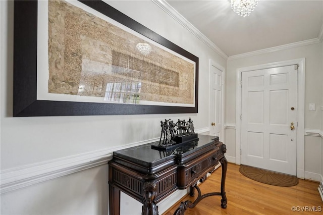 8203 Overbury Rd, Richmond, VA 23227 - entrance foyer featuring crown molding and wood finished floors