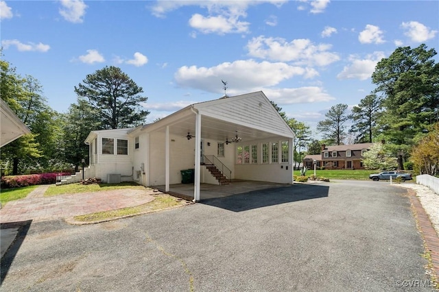 8203 Overbury Rd, Richmond, VA 23227 - exterior space featuring aphalt driveway, ceiling fan, and an attached carport