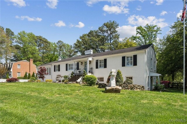 8203 Overbury Rd, Richmond, VA 23227 - view of front of home featuring a chimney and a front yard