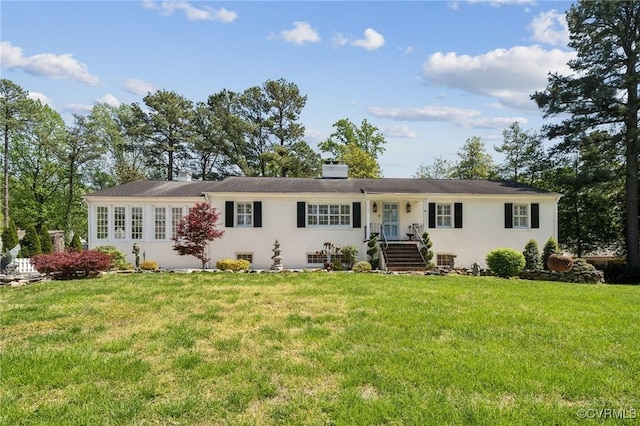 8203 Overbury Rd, Richmond, VA 23227 - ranch-style home with a chimney, a front yard, and stucco siding