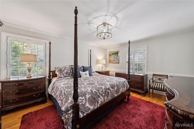 8203 Overbury Rd, Richmond, VA 23227 - bedroom with multiple windows, light wood finished floors, and crown molding