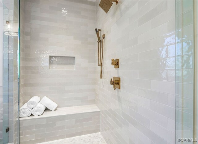 full bathroom featuring a shower stall