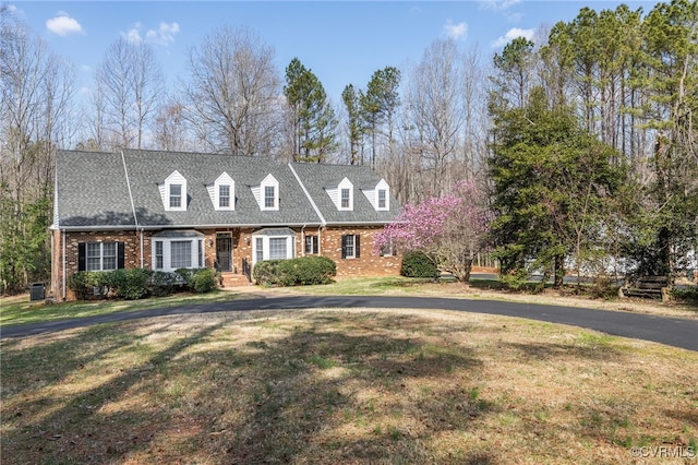 14007 Spring Rd, Montpelier, VA 23192 - new england style home featuring brick siding and a front lawn