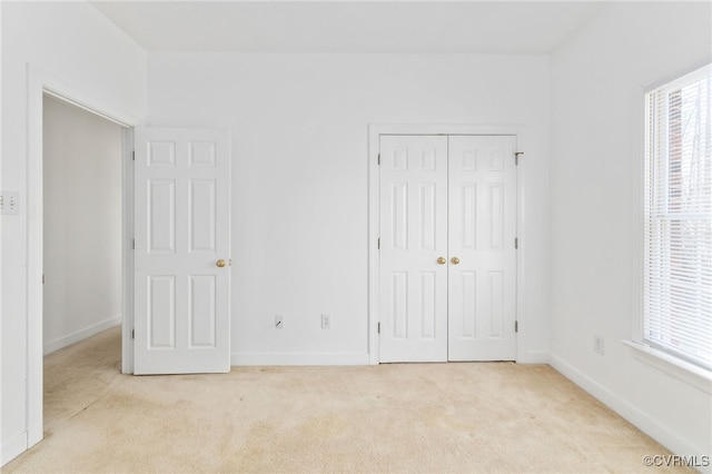 14007 Spring Rd, Montpelier, VA 23192 - unfurnished bedroom featuring light colored carpet, a closet, and baseboards