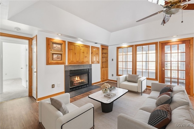 14007 Spring Rd, Montpelier, VA 23192 - living area featuring wood finished floors, a ceiling fan, baseboards, and healthy amount of natural light