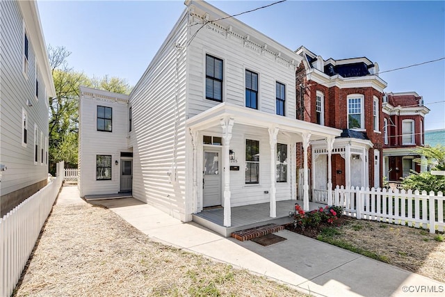 2205 Fairmount Ave, Richmond, VA 23223 - view of front of house with fence and covered porch