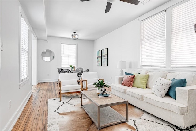 2205 Fairmount Ave, Richmond, VA 23223 - living area featuring baseboards, hardwood / wood-style flooring, and a ceiling fan