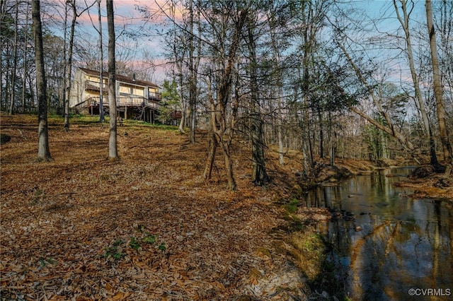 14304 Horseshoe Ford Rd, Ashland, VA 23005 - yard at dusk with a wooden deck