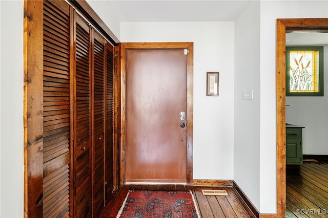 14304 Horseshoe Ford Rd, Ashland, VA 23005 - doorway with dark wood-style flooring, visible vents, and baseboards