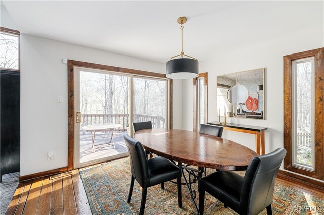 14304 Horseshoe Ford Rd, Ashland, VA 23005 - dining room featuring baseboards and hardwood / wood-style flooring