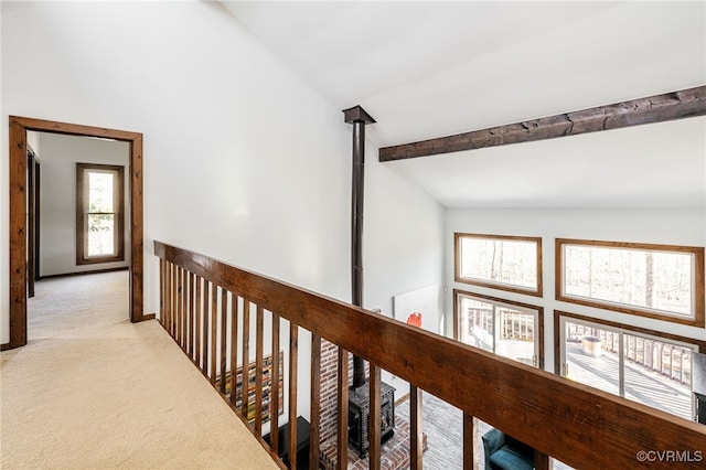14304 Horseshoe Ford Rd, Ashland, VA 23005 - hallway featuring lofted ceiling with beams, light carpet, and plenty of natural light