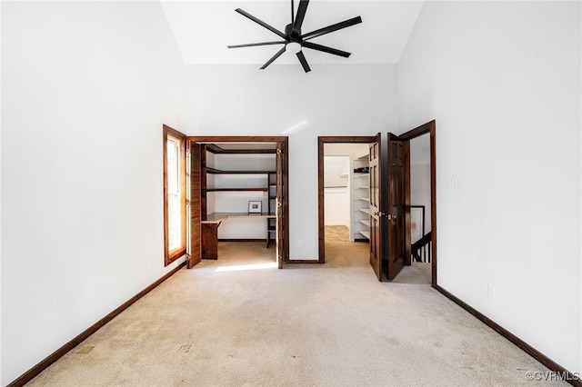 14304 Horseshoe Ford Rd, Ashland, VA 23005 - unfurnished bedroom with a closet, carpet, baseboards, a spacious closet, and high vaulted ceiling