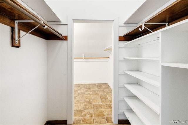 14304 Horseshoe Ford Rd, Ashland, VA 23005 - spacious closet featuring stone finish flooring