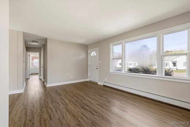 111 N Battery St, Highland Springs, VA 23075 - entrance foyer with baseboard heating, dark wood-style flooring, and baseboards