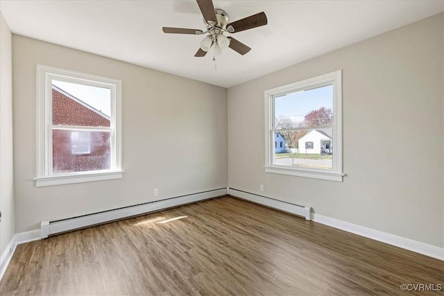 111 N Battery St, Highland Springs, VA 23075 - empty room with plenty of natural light, wood finished floors, a ceiling fan, and baseboards