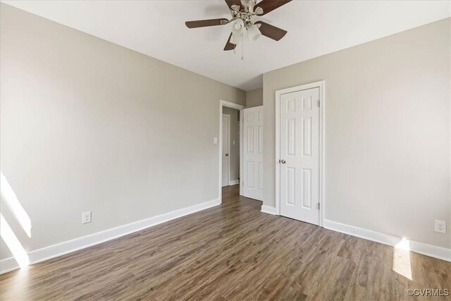 111 N Battery St, Highland Springs, VA 23075 - unfurnished bedroom with wood finished floors, baseboards, and a closet