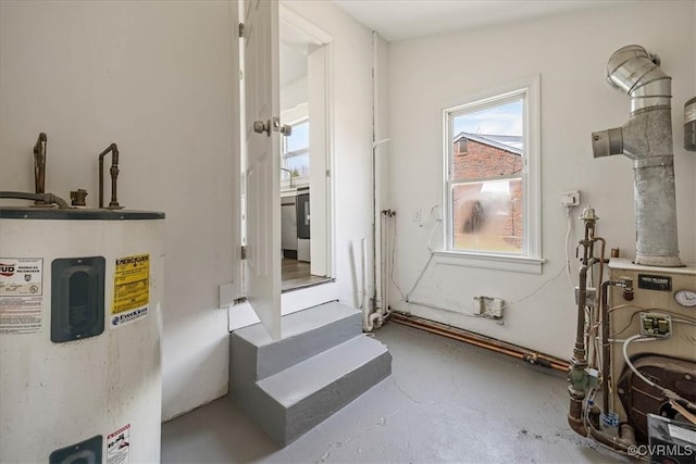 111 N Battery St, Highland Springs, VA 23075 - corridor featuring water heater and concrete flooring