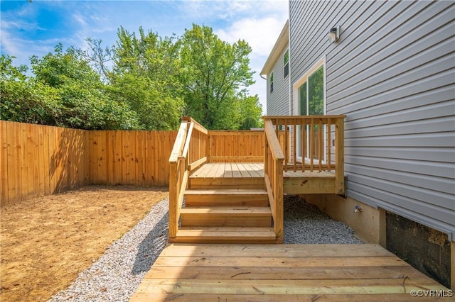 deck featuring fence private yard