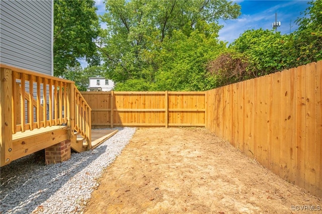 view of yard featuring a fenced backyard