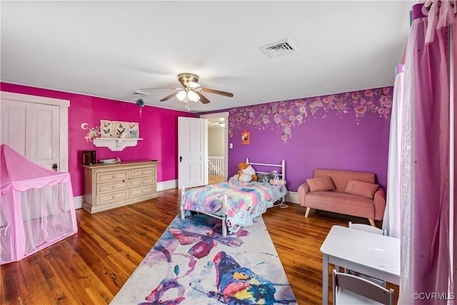 1016 Court St, Victoria, VA 23974 - bedroom with visible vents, baseboards, a ceiling fan, and wood finished floors