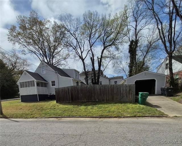 309 Royal Oak Ave, Colonial Heights, VA 23834 - view of property exterior with an outdoor structure, a garage, and concrete driveway