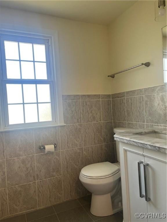 309 Royal Oak Ave, Colonial Heights, VA 23834 - half bath featuring tile walls, tile patterned flooring, vanity, and wainscoting