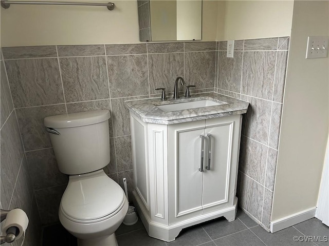 309 Royal Oak Ave, Colonial Heights, VA 23834 - bathroom featuring tile walls, tile patterned floors, and vanity