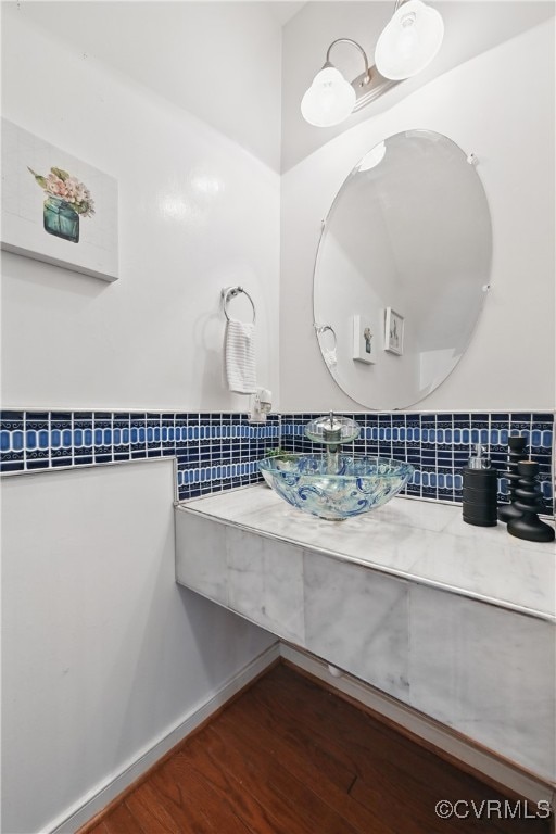 11418 Parrish Creek Ln, Chesterfield, VA 23832 - bathroom featuring wood finished floors, vanity, and decorative backsplash