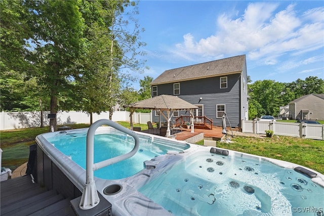 11418 Parrish Creek Ln, Chesterfield, VA 23832 - view of swimming pool featuring an outdoor hot tub, a gazebo, a deck, and a fenced backyard