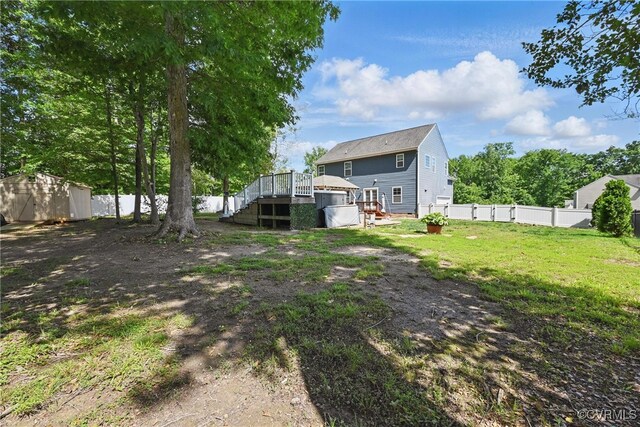 11418 Parrish Creek Ln, Chesterfield, VA 23832 - back of property with a wooden deck, stairway, and a fenced backyard