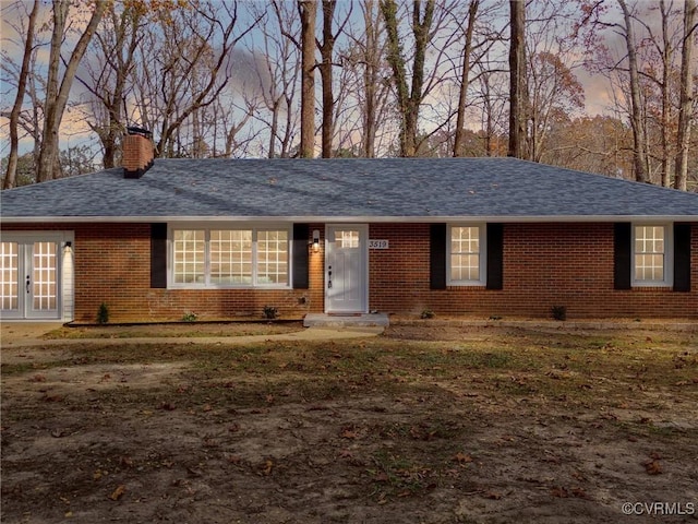 3519 Murchies Hill Rd, Chesterfield, VA 23234 - ranch-style house with french doors, a chimney, a shingled roof, and brick siding