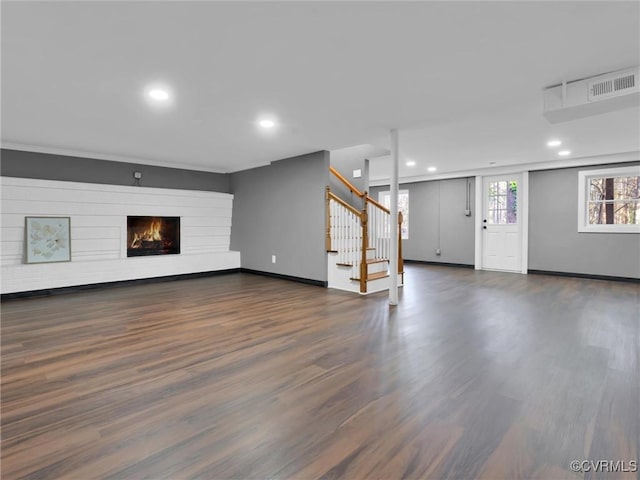 3519 Murchies Hill Rd, Chesterfield, VA 23234 - unfurnished living room with stairway, a warm lit fireplace, dark wood finished floors, baseboards, and recessed lighting