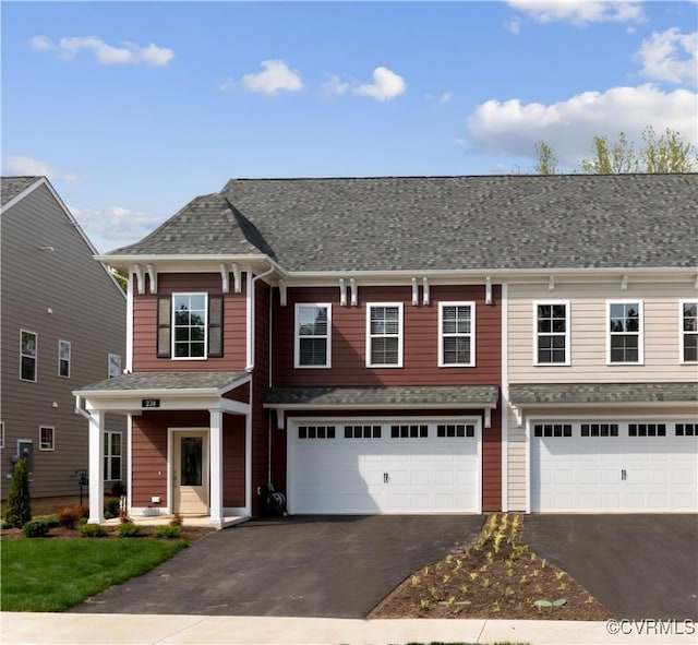 124 Steyland St, Ashland, VA 23005 - view of property with asphalt driveway and a garage