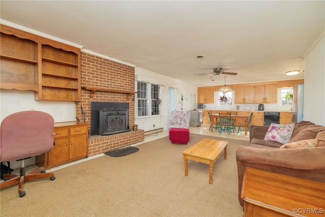 living area with a ceiling fan and light colored carpet