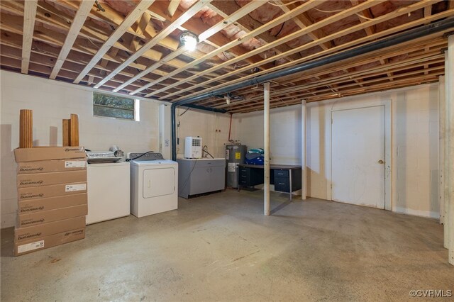 below grade area with water heater and independent washer and dryer