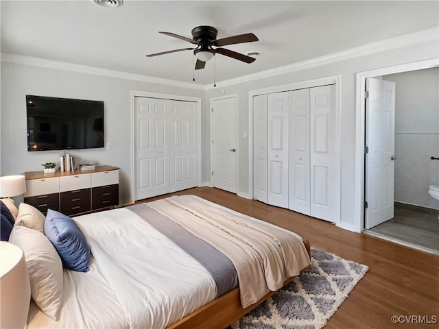201 Winston Ave, Colonial Heights, VA 23834 - bedroom with wood finished floors, two closets, crown molding, a ceiling fan, and ensuite bathroom