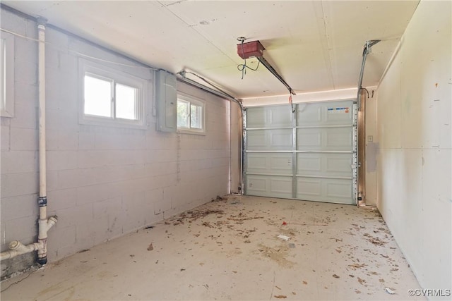 201 Winston Ave, Colonial Heights, VA 23834 - garage featuring a garage door opener and concrete block wall