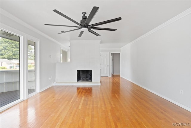 201 Winston Ave, Colonial Heights, VA 23834 - unfurnished living room featuring ceiling fan, light wood-style floors, crown molding, a fireplace, and baseboards