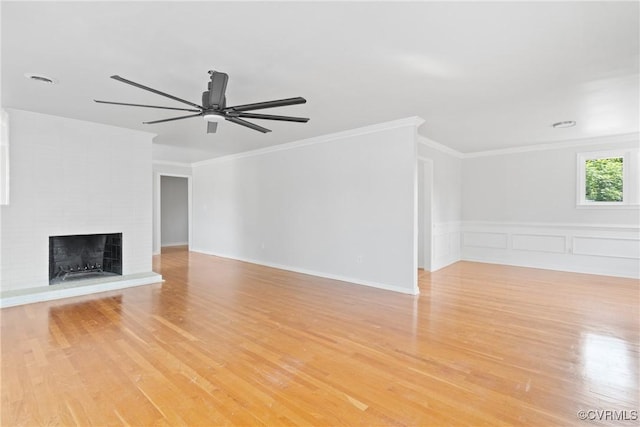 201 Winston Ave, Colonial Heights, VA 23834 - unfurnished living room with ceiling fan, light wood-style floors, a fireplace, and ornamental molding
