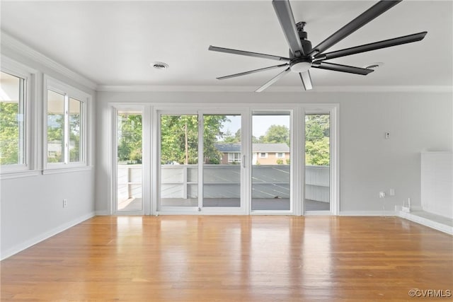 201 Winston Ave, Colonial Heights, VA 23834 - spare room with healthy amount of natural light, crown molding, wood finished floors, ceiling fan, and baseboards
