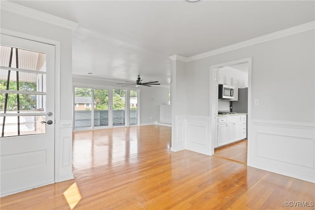 201 Winston Ave, Colonial Heights, VA 23834 - empty room with light wood-style flooring, crown molding, ceiling fan, and a wainscoted wall