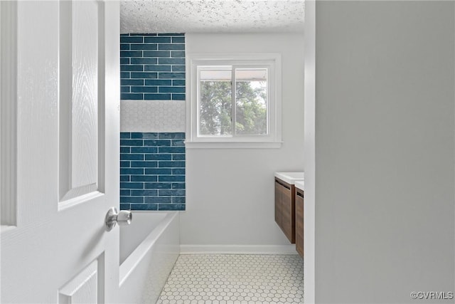 201 Winston Ave, Colonial Heights, VA 23834 - bathroom featuring vanity, a textured ceiling, and baseboards