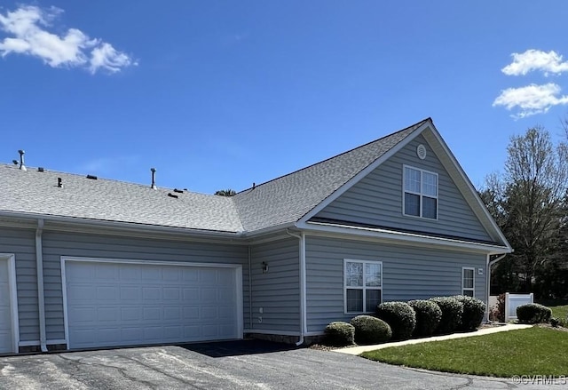 2566 Wanstead Ct, Richmond, VA 23238 - view of front of home featuring an attached garage, roof with shingles, and aphalt driveway