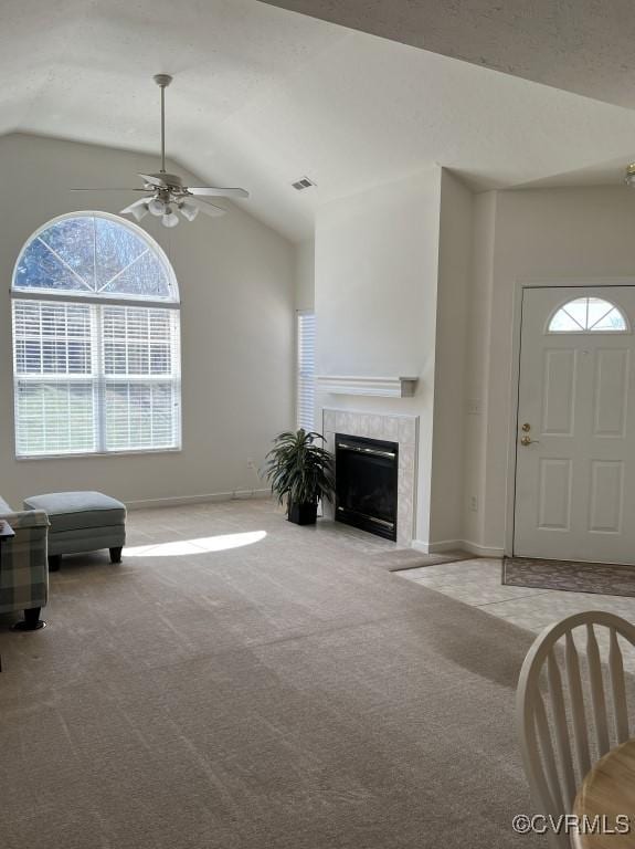 2566 Wanstead Ct, Richmond, VA 23238 - living room featuring carpet floors, a ceiling fan, baseboards, and lofted ceiling