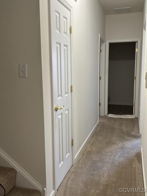 2566 Wanstead Ct, Richmond, VA 23238 - hallway featuring baseboards and carpet