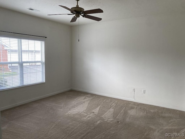 2566 Wanstead Ct, Richmond, VA 23238 - empty room featuring plenty of natural light, carpet, ceiling fan, and visible vents